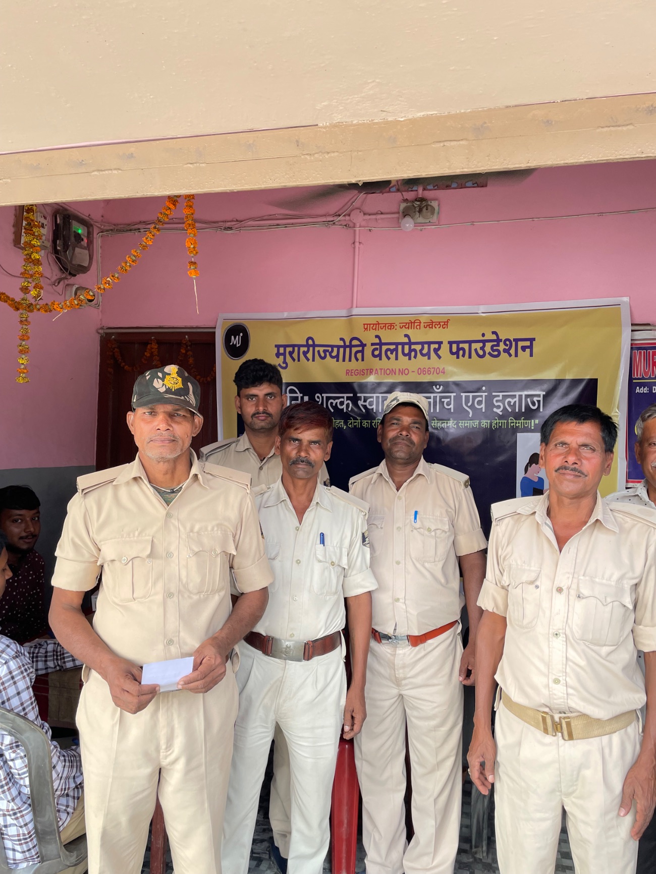Community members after free screenings at an MJWF health camp.